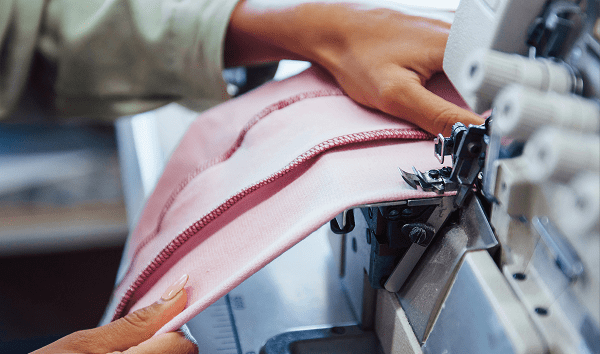 pink fabric sewing machine